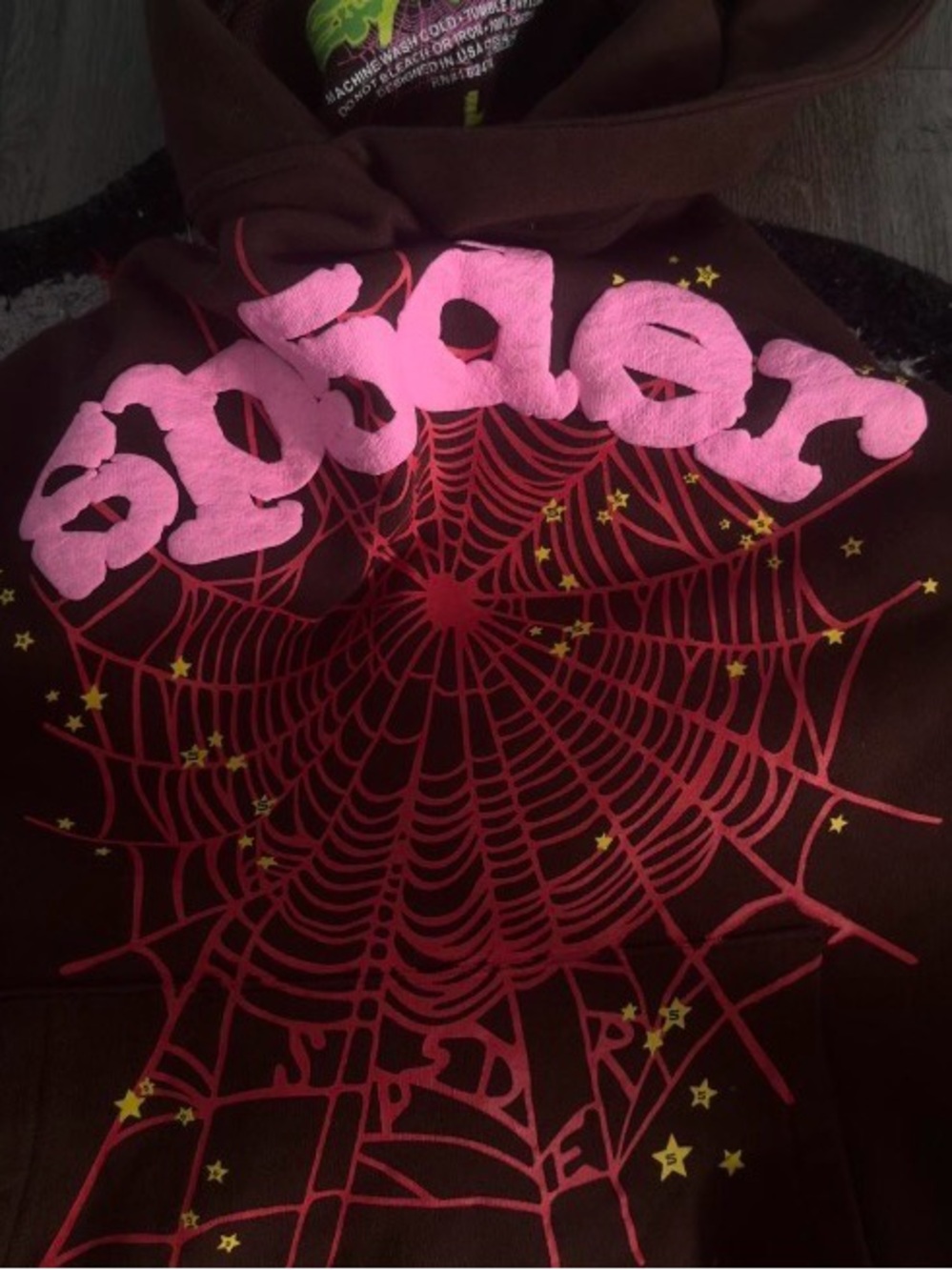 Men's Brown Hoodie with Pink Logo and Red Web Graphic